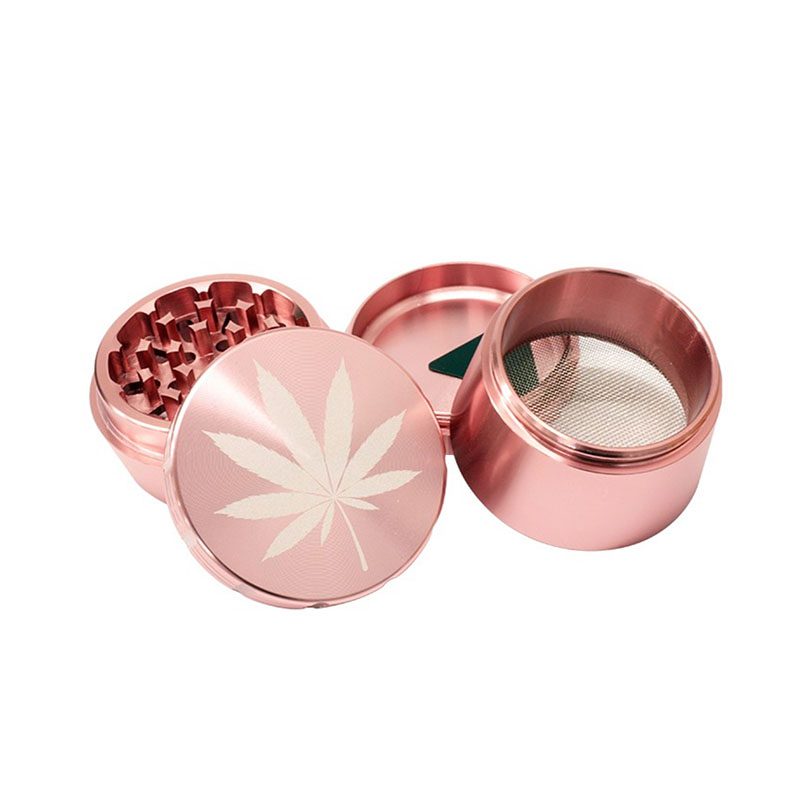 grinder-de-4 partes de metal con hoja gravada color rosa en forma de reloj de arena